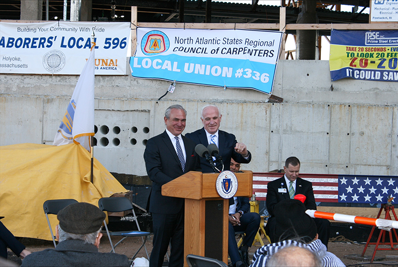 Commodore Builders and Walsh Brothers celebrate the topping off of new veterans’ home
